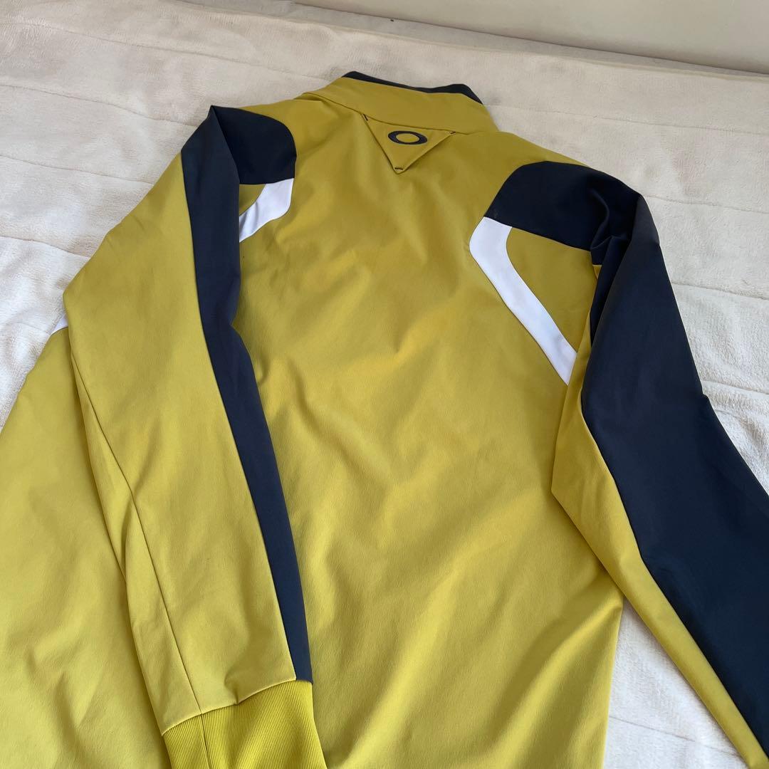 オークリー ゴルフウェア 長袖ウインドブレーカー サイズＬ 黄色 日本正規品