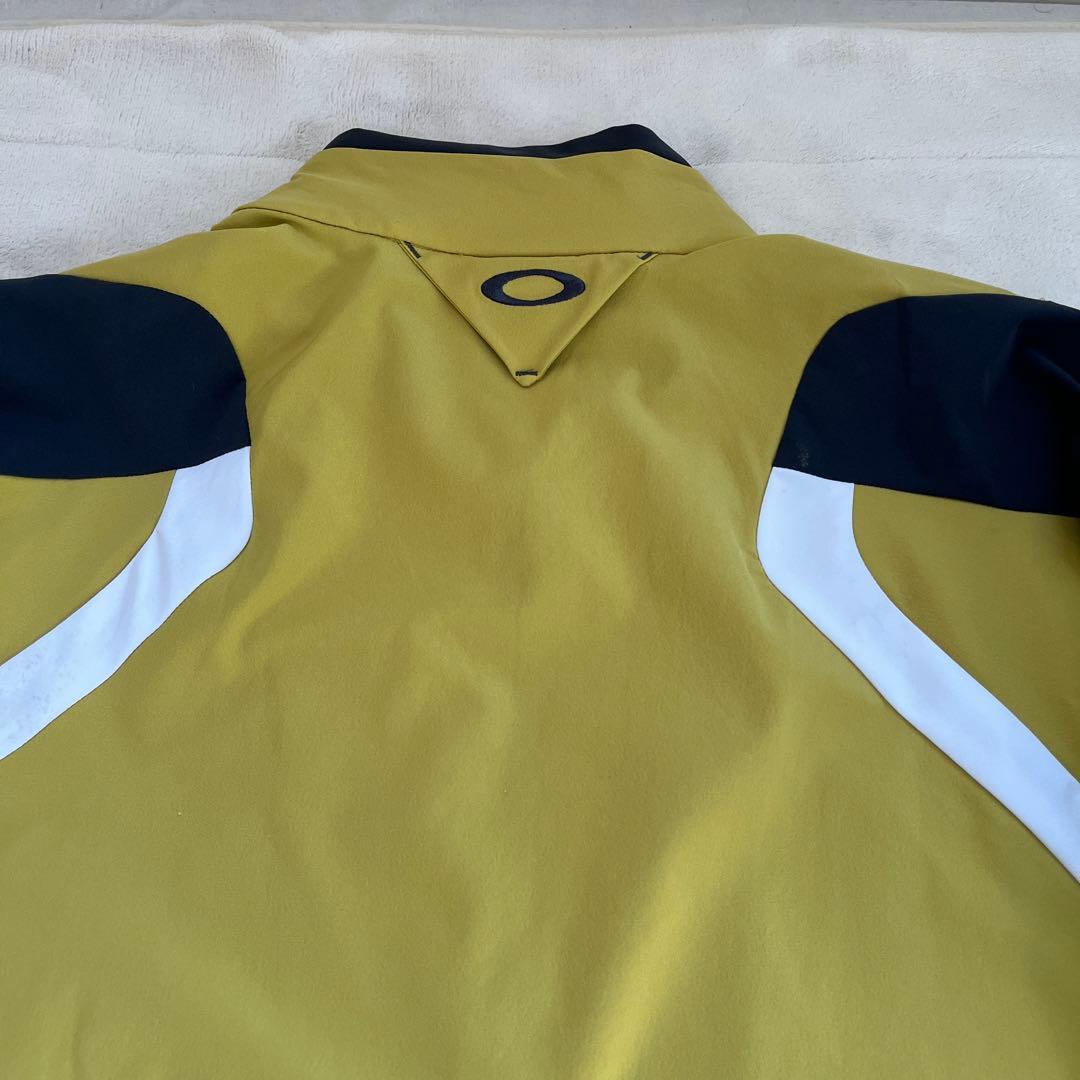 オークリー ゴルフウェア 長袖ウインドブレーカー サイズＬ 黄色 日本正規品